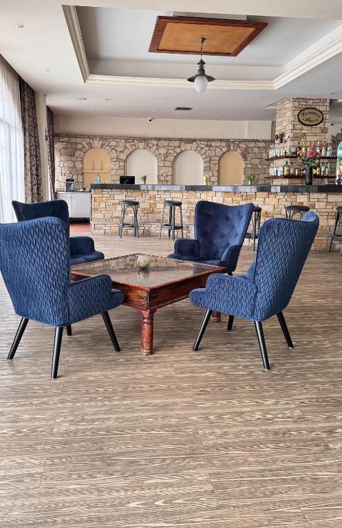 Posezení v ubytování Navarria Blue Hotel