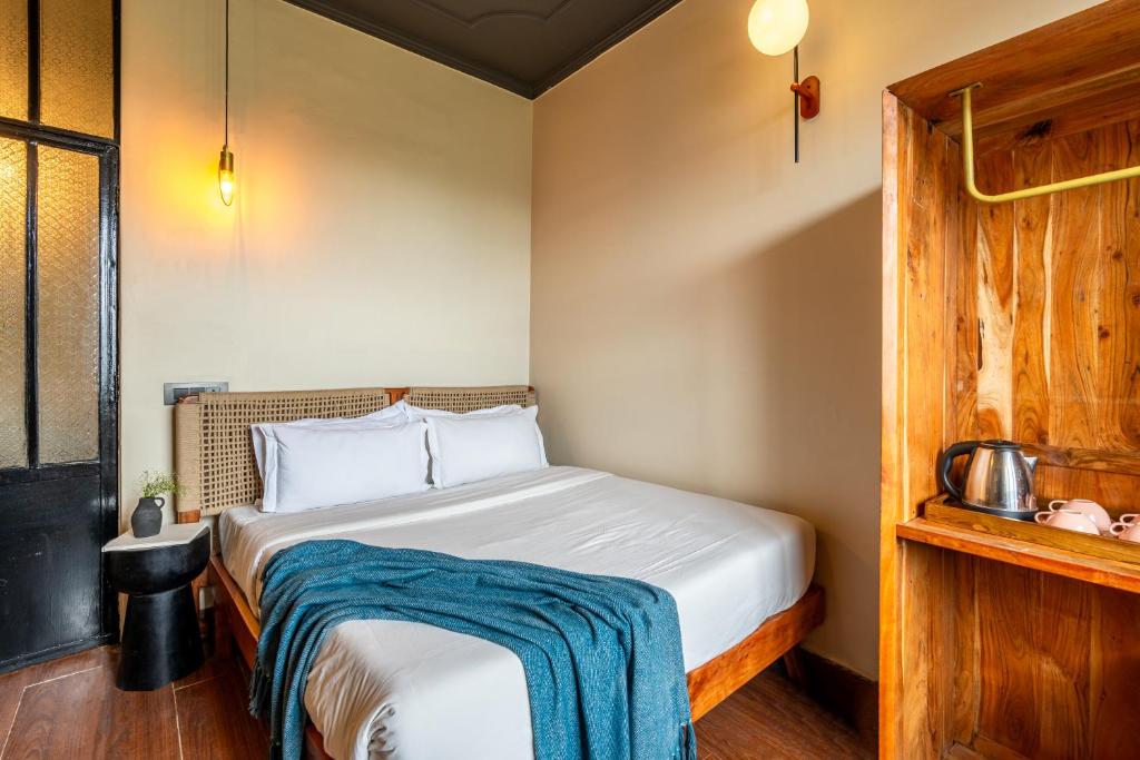 Letto o letti in una camera di Minimalist One Hauz Khas Village