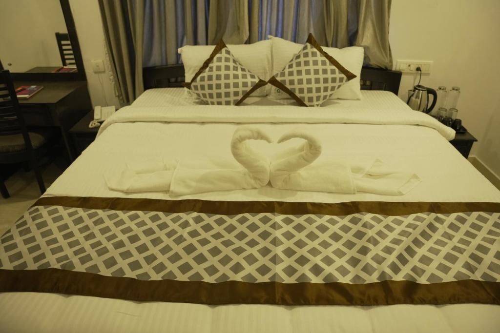 Postel nebo postele na pokoji v ubytování G3 Star Comfort