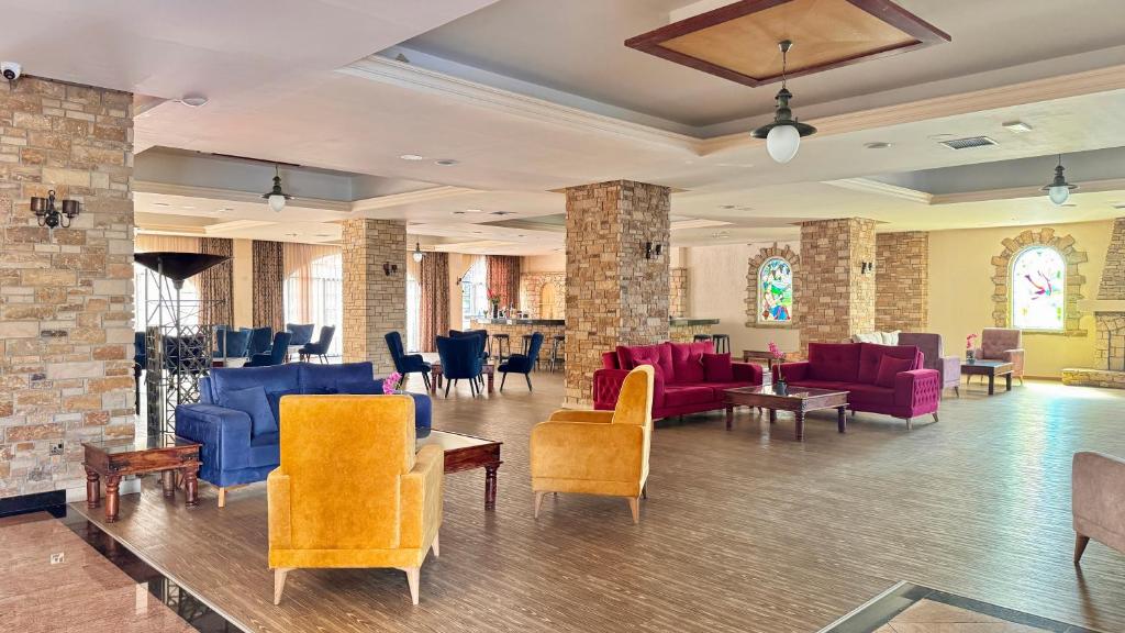 Posezení v ubytování Navarria Blue Hotel