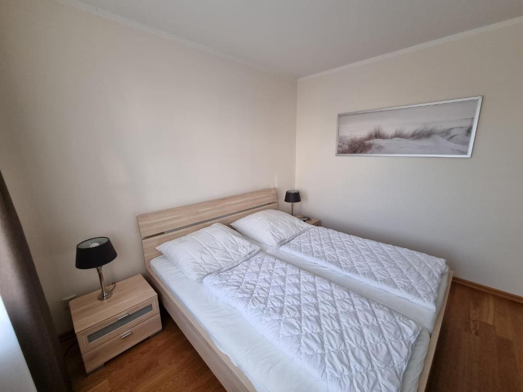 Postel nebo postele na pokoji v ubytování Parkresidenz