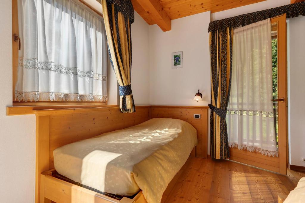 Postel nebo postele na pokoji v ubytování Agritur Maso Pan