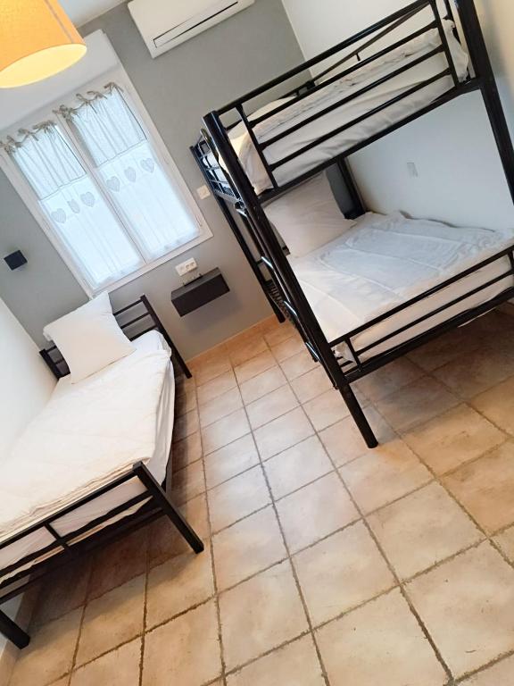 Postel nebo postele na pokoji v ubytování Gîte Pierre Blanche