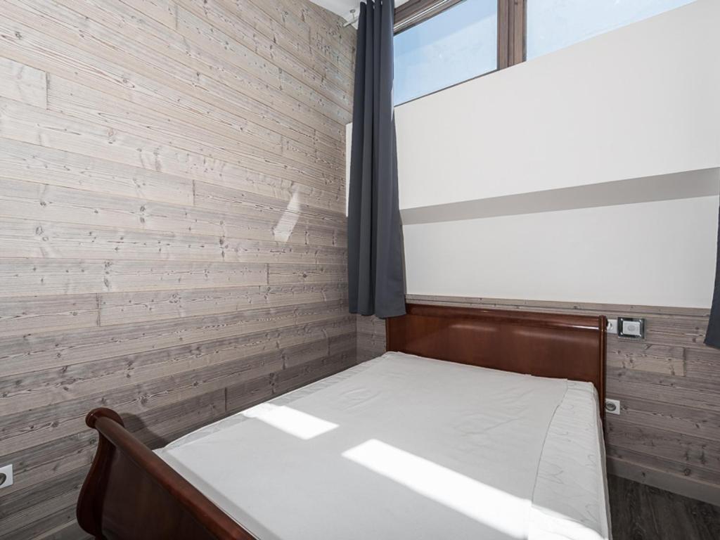 Posteľ alebo postele v izbe v ubytovaní Duplex rénové, skis aux pieds, balcon, proche commerces, 8 pers, animaux acceptés - FR-1-502-466