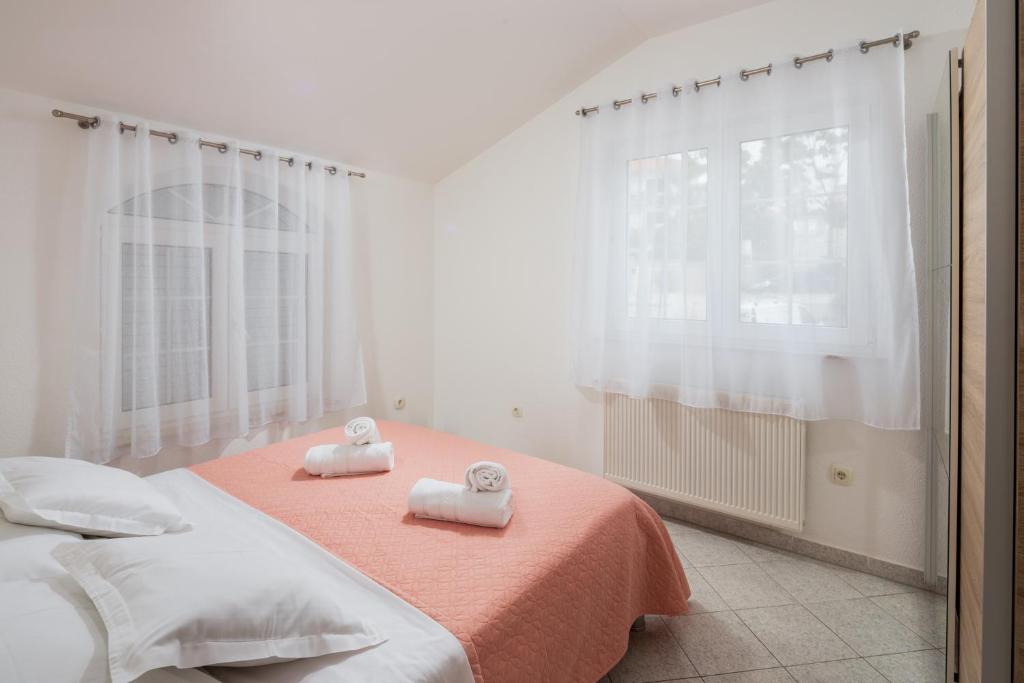Posteľ alebo postele v izbe v ubytovaní Villa Kristina