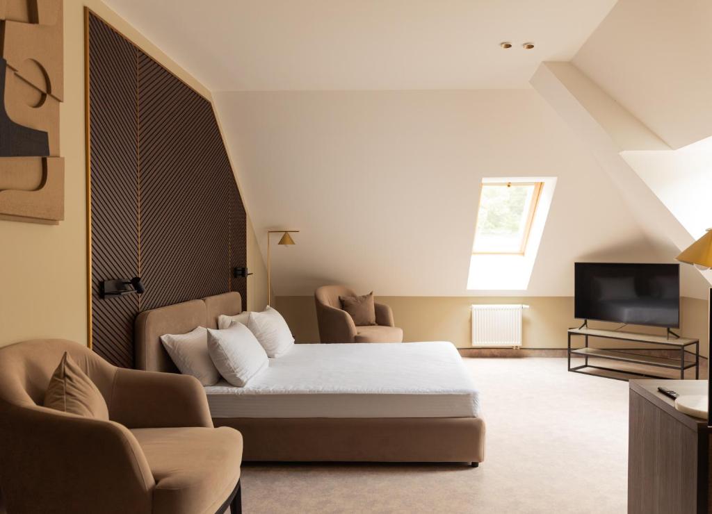 TV a/nebo společenská místnost v ubytování Park Hotel Bristol