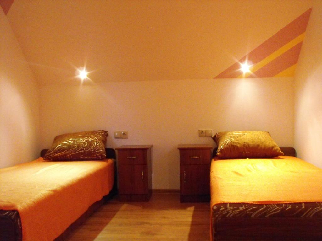 Posteľ alebo postele v izbe v ubytovaní Noclegi u Brody