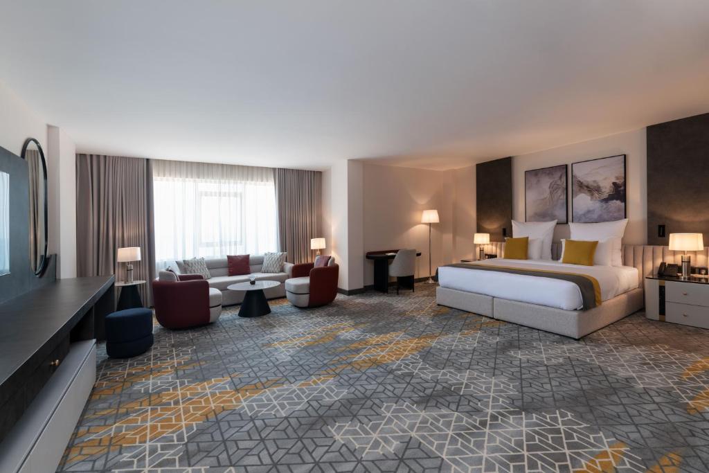 Postel nebo postele na pokoji v ubytování Enala Hotel- Umluj
