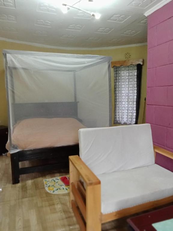 Postel nebo postele na pokoji v ubytování Tiny Haven