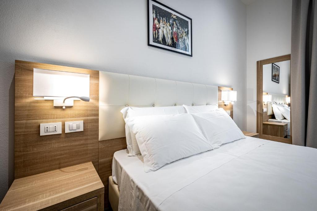 Letto o letti in una camera di YD elegant apt with garden