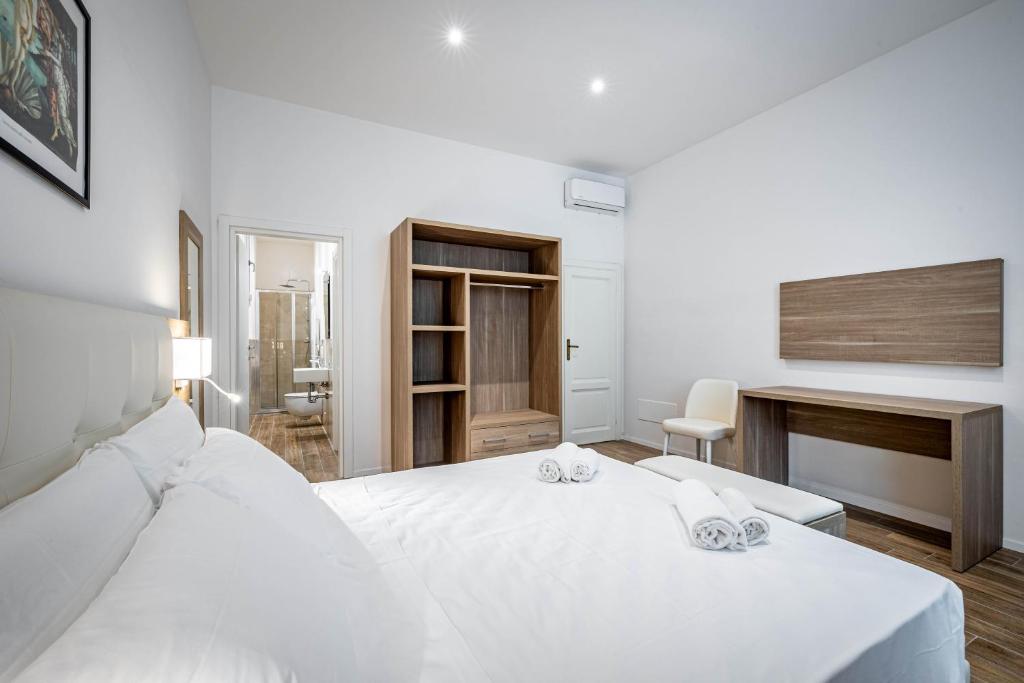 Letto o letti in una camera di YD elegant apt with garden