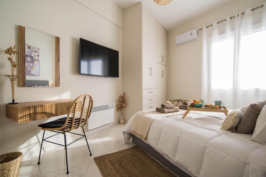 TV a/nebo společenská místnost v ubytování Aquamarine - Beach Flat