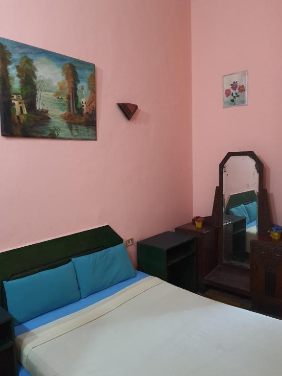 Postel nebo postele na pokoji v ubytování African House Hostel