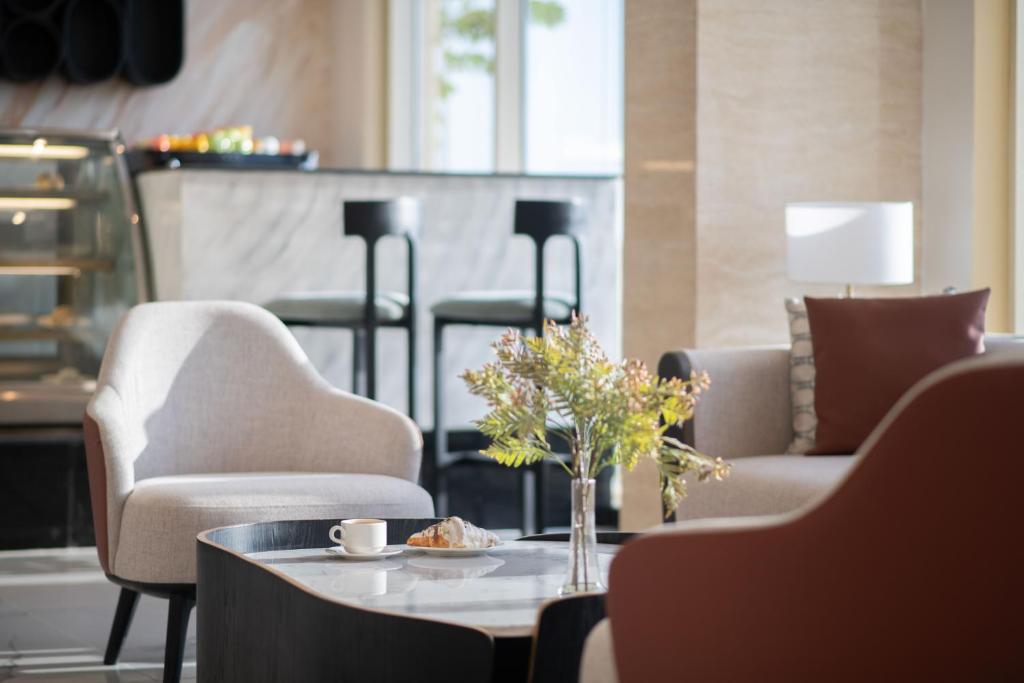 Posezení v ubytování Enala Hotel- Umluj