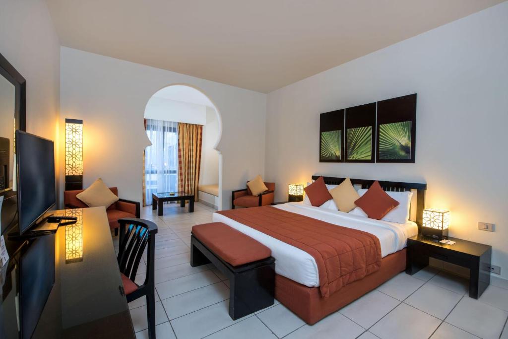 Кровать или кровати в номере Sentido Reef Oasis Aqua Park Resort