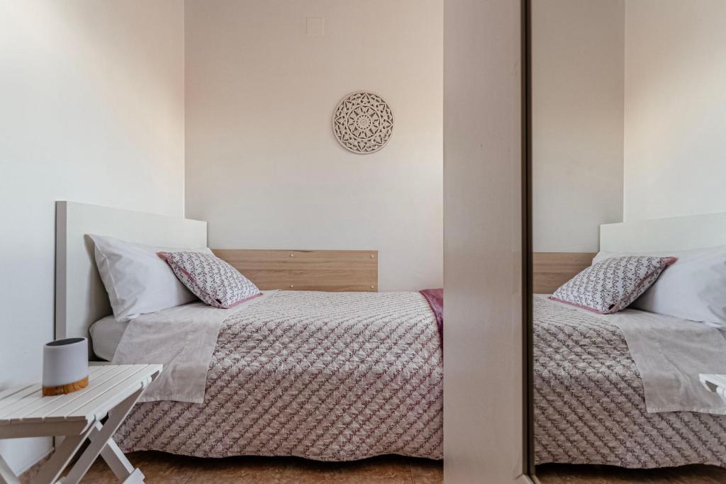 Posteľ alebo postele v izbe v ubytovaní Apartamento Orient en Palamós tercera línea de mar