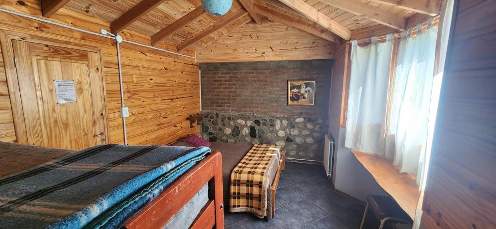 Postel nebo postele na pokoji v ubytování Carelhue
