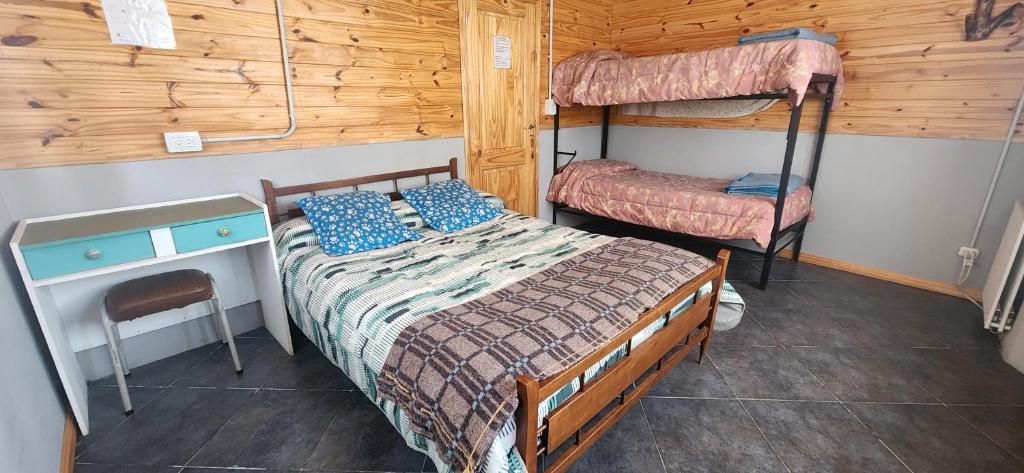 Postel nebo postele na pokoji v ubytování Carelhue