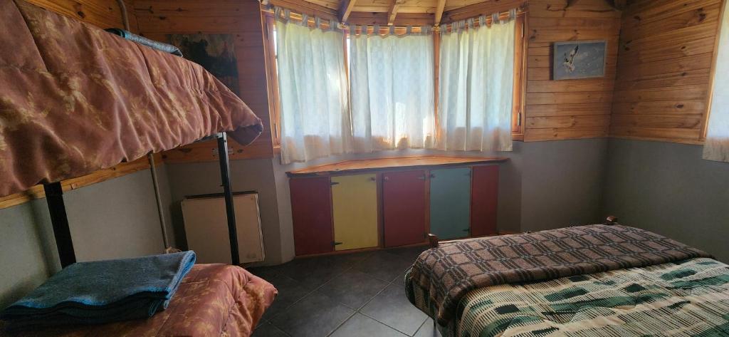 Postel nebo postele na pokoji v ubytování Carelhue