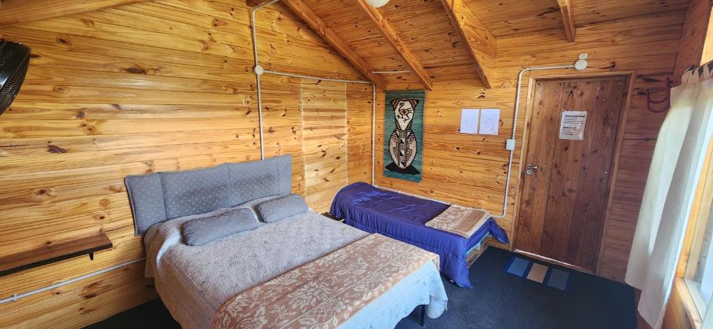 Postel nebo postele na pokoji v ubytování Carelhue