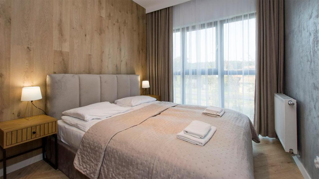 Postel nebo postele na pokoji v ubytování Baltic Porto-Porto 36