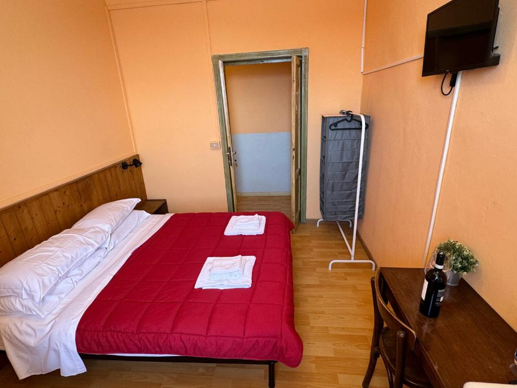 Voodi või voodid majutusasutuse Baita Brunate Cao toas