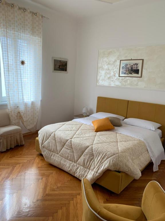 Postel nebo postele na pokoji v ubytování SoleMare Rooms Trieste
