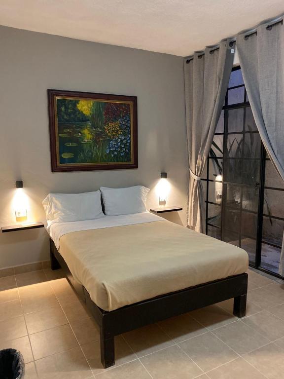 Postel nebo postele na pokoji v ubytování Hostel Inn