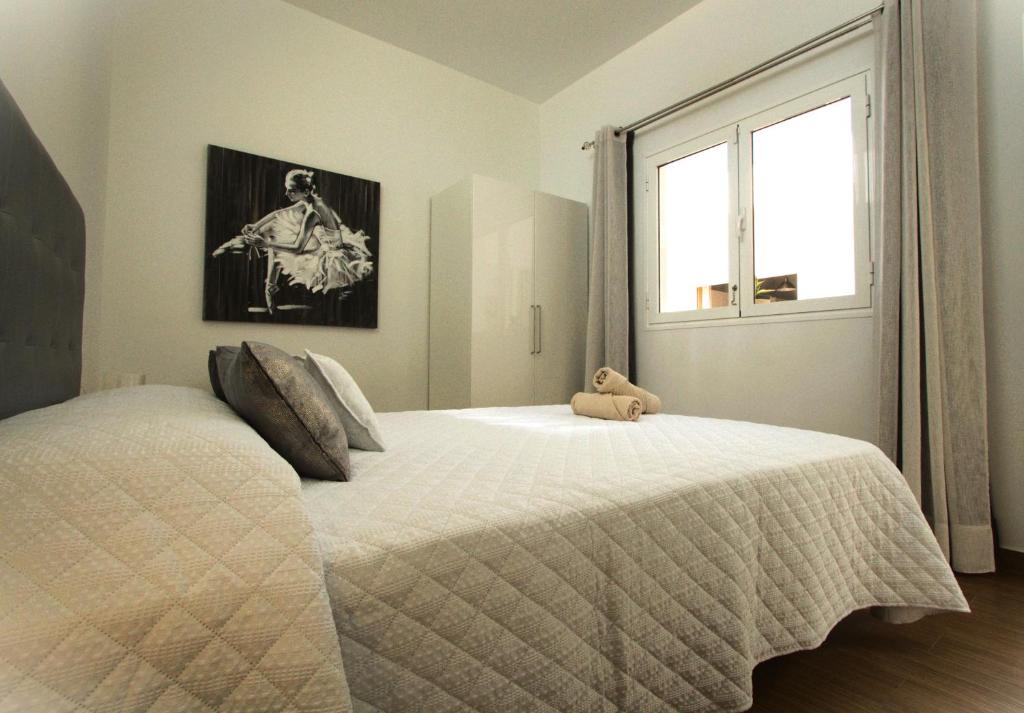 Postel nebo postele na pokoji v ubytování Casa Ita