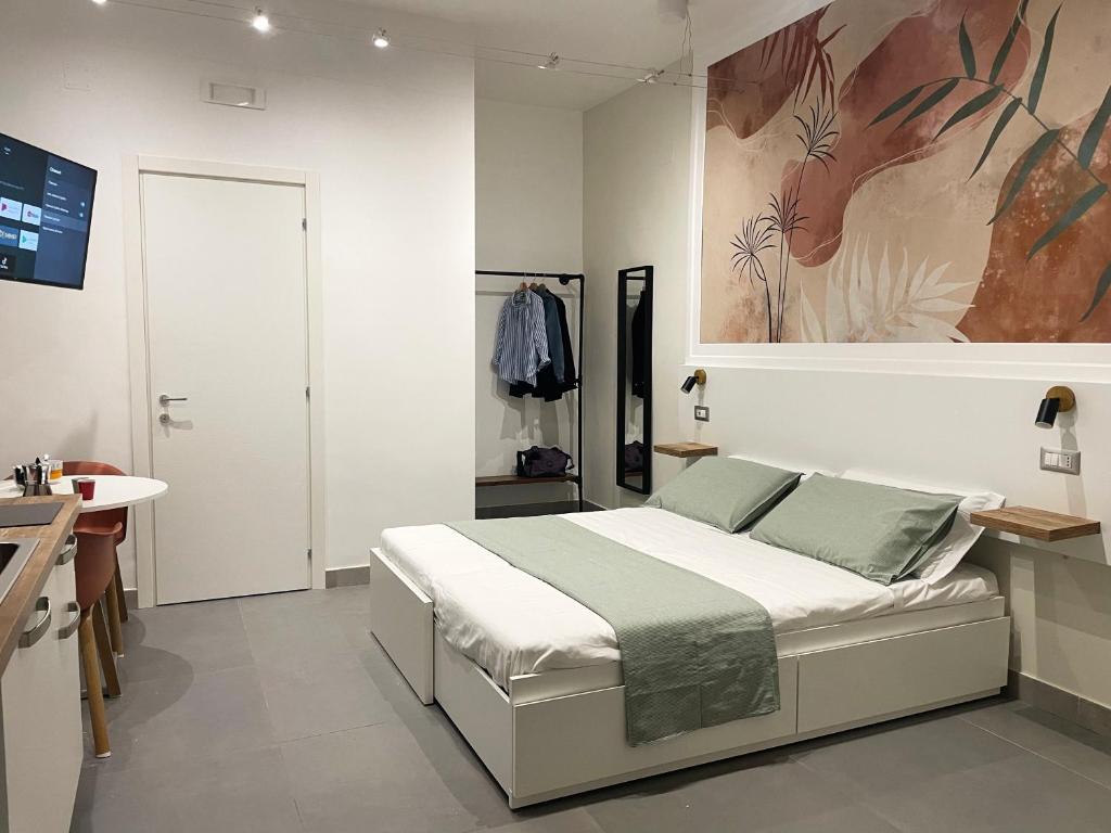 Cama ou camas em um quarto em Inner Naples 2.0