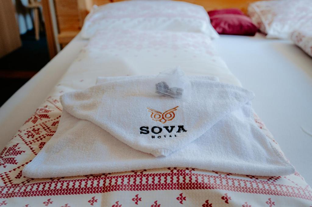 Postel nebo postele na pokoji v ubytování Sova tourist B&B