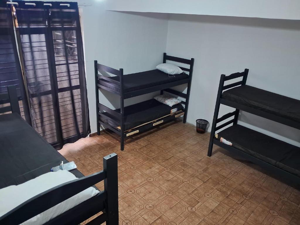 Ένα ή περισσότερα κρεβάτια σε δωμάτιο στο Hostel Repou-Z