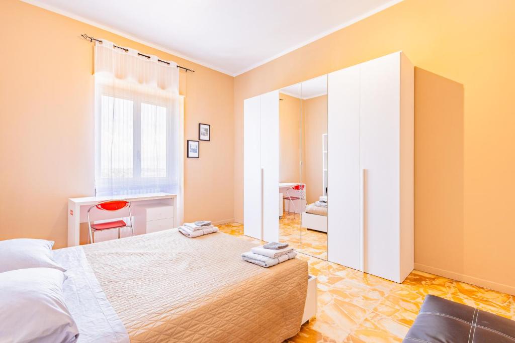 Postel nebo postele na pokoji v ubytování Casa Lungogesso