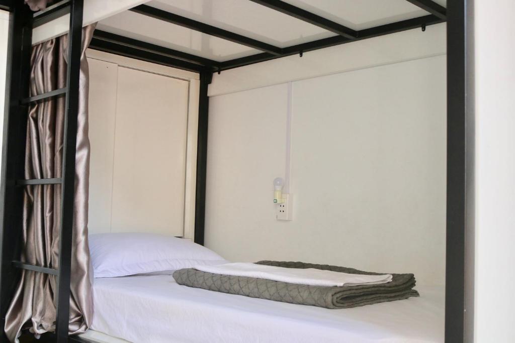 Postel nebo postele na pokoji v ubytování RiverView Homestay