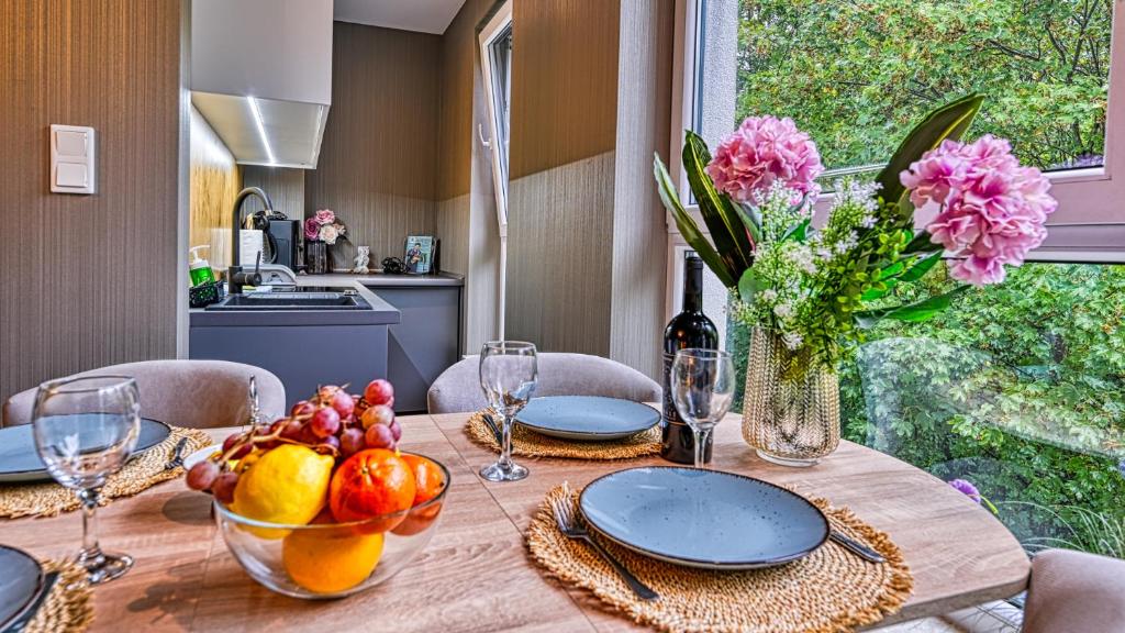 Kuchyňa alebo kuchynka v ubytovaní Apartament SPA 44 Resort Kozubnik blisko Szczyrk- 5D Apartamenty