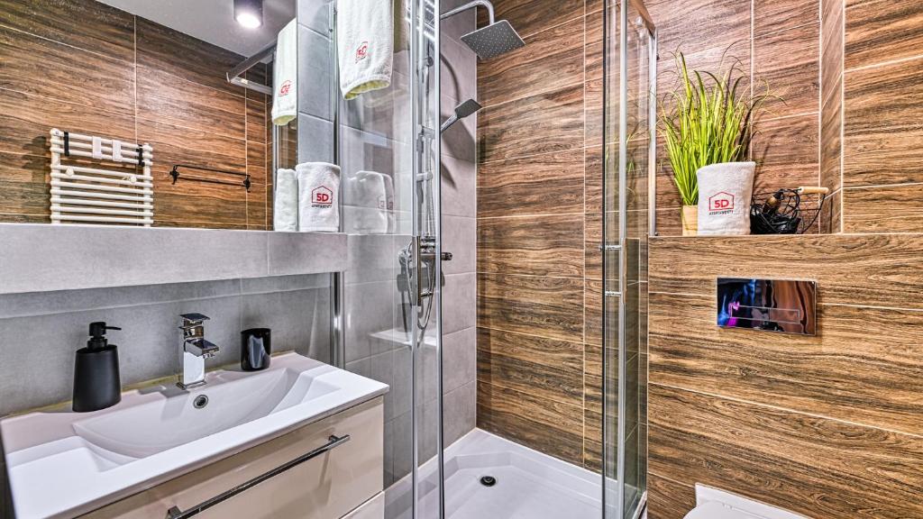 Kúpeľňa v ubytovaní Apartament SPA 44 Resort Kozubnik blisko Szczyrk- 5D Apartamenty