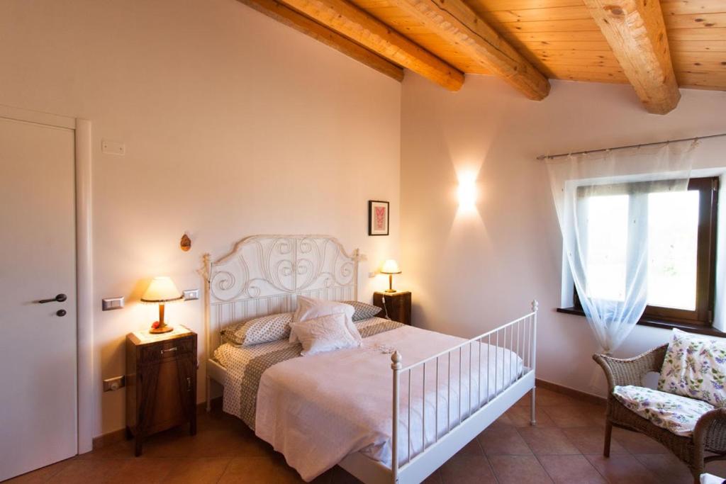 Posteľ alebo postele v izbe v ubytovaní Casa Vacanze Angelica