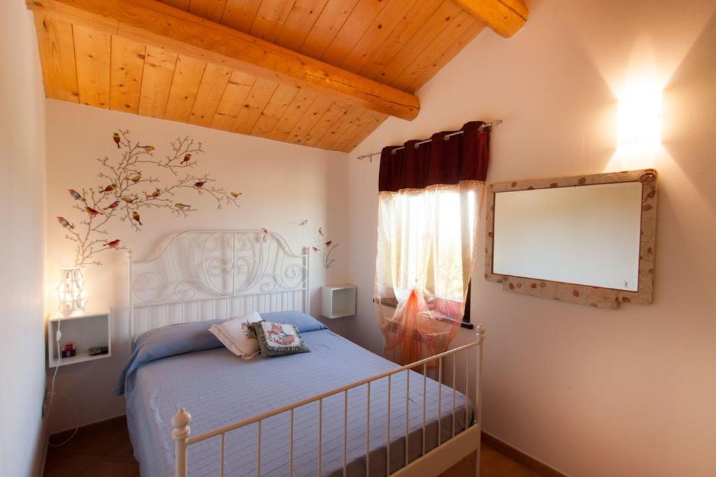 Posteľ alebo postele v izbe v ubytovaní Casa Vacanze Angelica