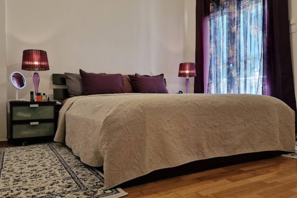 Postel nebo postele na pokoji v ubytování Modern apartment in Neo Faliro