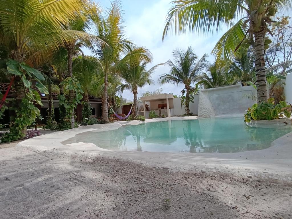 Bazén v ubytování Secret Paradise Mahahual nebo v jeho okolí