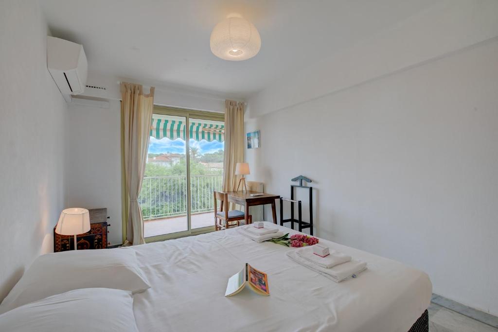 Posteľ alebo postele v izbe v ubytovaní L'Ermitage - Happy Rentals