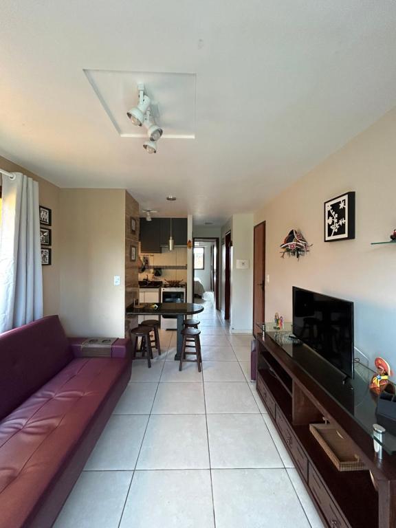 a living room with a couch and a table at flat serra negra - bezerros - PE flat 007 - 009 in Bezerros