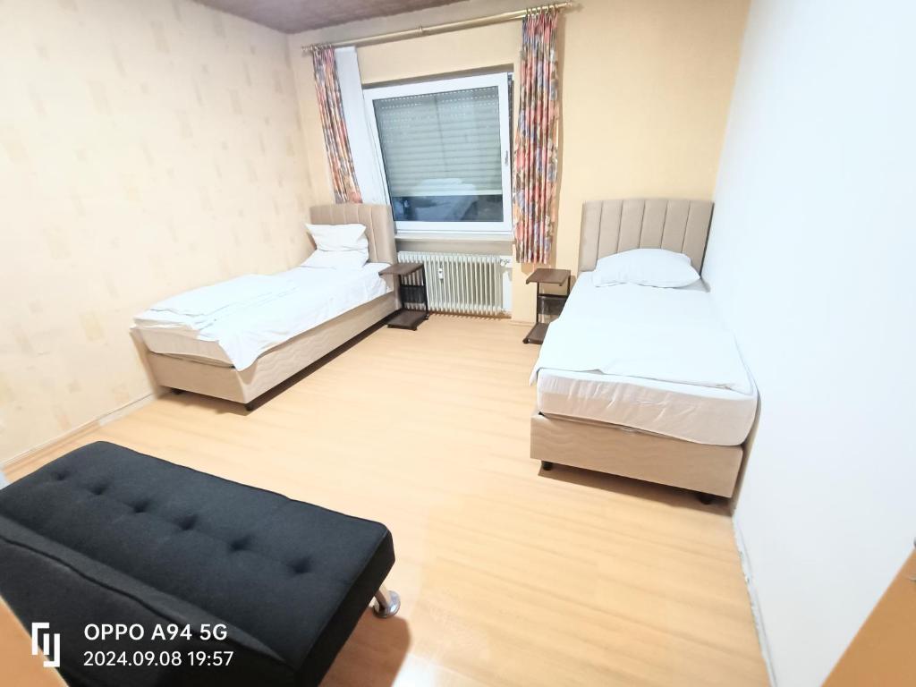 Ένα ή περισσότερα κρεβάτια σε δωμάτιο στο Accomodation Worfelden