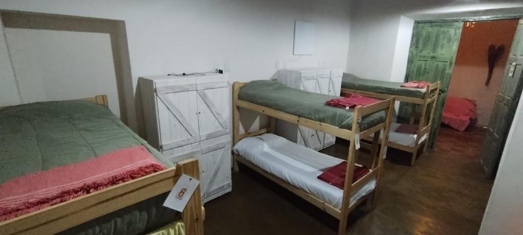 Postel nebo postele na pokoji v ubytování Cielito Lindo