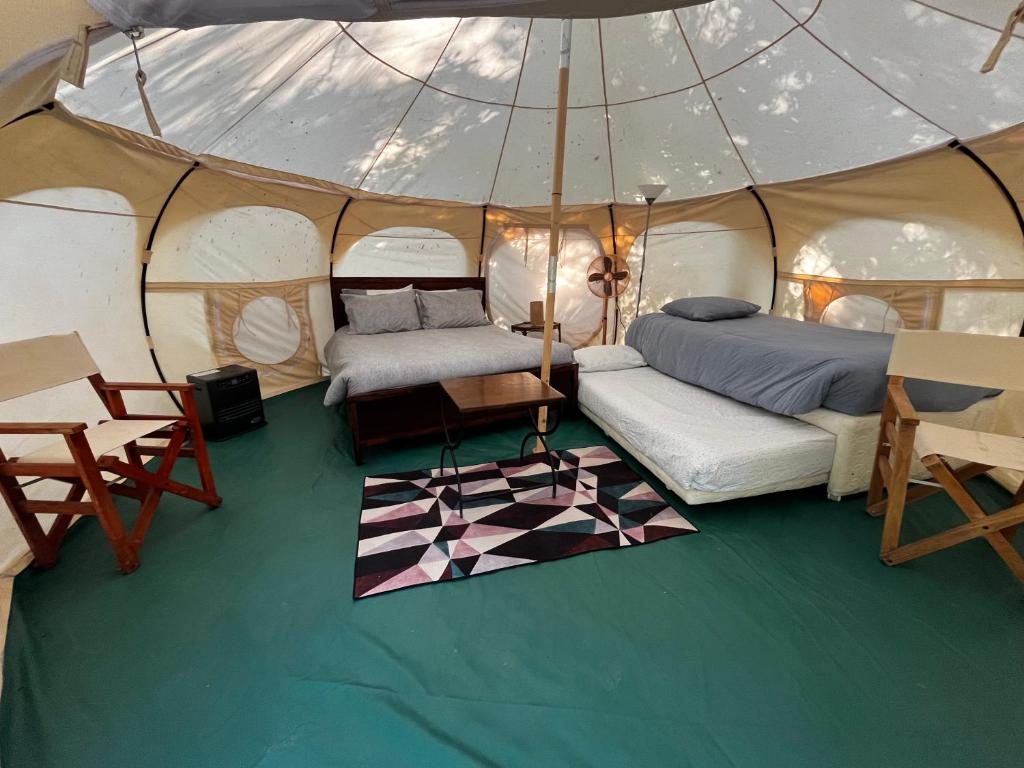 Postel nebo postele na pokoji v ubytování Glamping Remanso del Espíritu