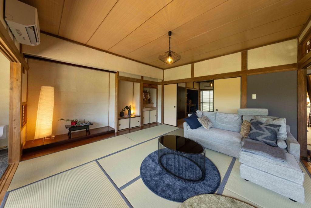 Postel nebo postele na pokoji v ubytování 国東市の自然に囲まれた一棟貸し宿