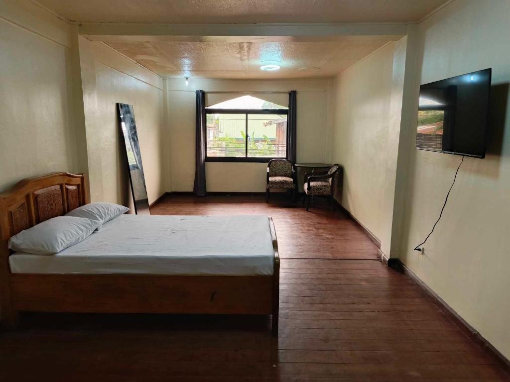 Postel nebo postele na pokoji v ubytování starlight lodging house