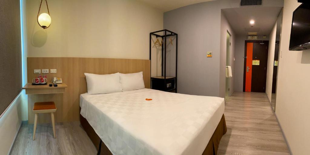 Postel nebo postele na pokoji v ubytování Go Hotels Plus Mandaluyong