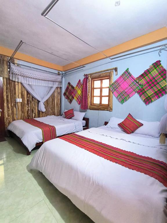 Postel nebo postele na pokoji v ubytování Xúa Vừ Homestay