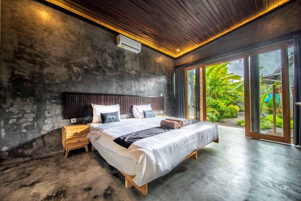 Postel nebo postele na pokoji v ubytování Dedeane ubud